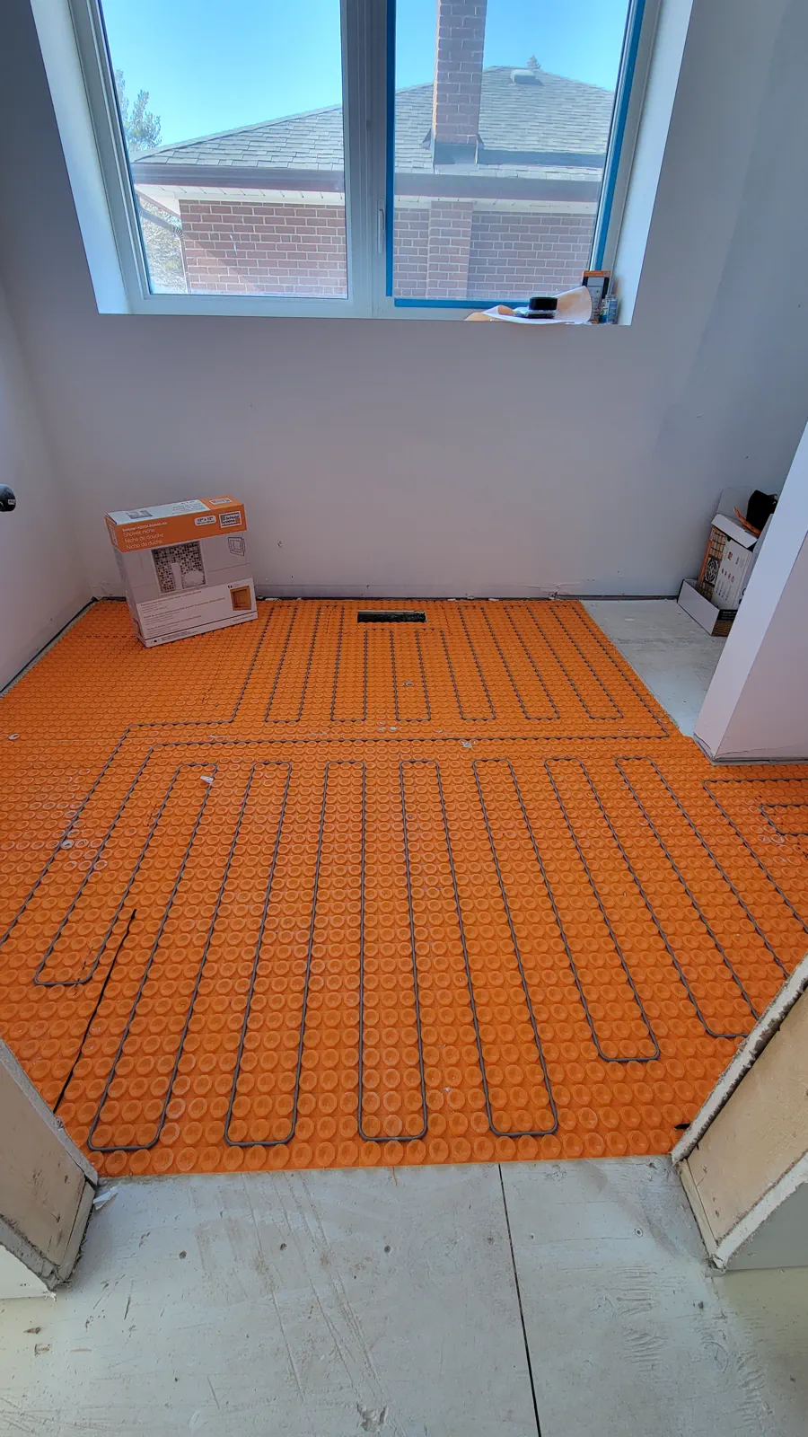 Residential renovation with floor heating wire installed.